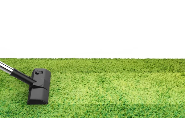 Чистка вакууму на зеленому килимі — стокове фото