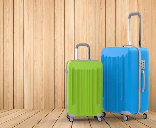 blue and green hard case luggages