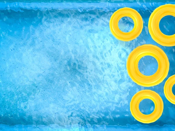 Sárga úszás gyűrűk medence — Stock Fotó