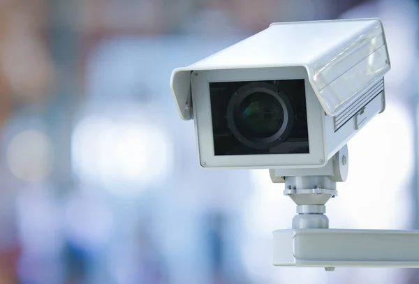 CCTV kamery nebo bezpečnostní kamery na maloobchodní prodejna rozmazané pozadí — Stock fotografie