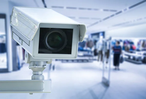 CCTV kamery lub aparatu bezpieczeństwa na sklep detaliczny niewyraźne tło — Zdjęcie stockowe