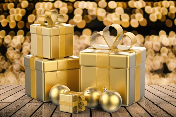 Heap of golden gift boxes and golden christmas balls — Stock Photo, Image