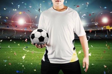 stadyum arka plan ile topa sahip oyuncu