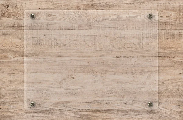 Tablero de cristal o marco acrílico sobre fondo de madera — Foto de Stock