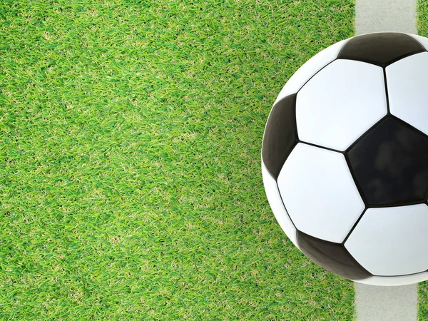 Yeşil çimlerde futbol topu