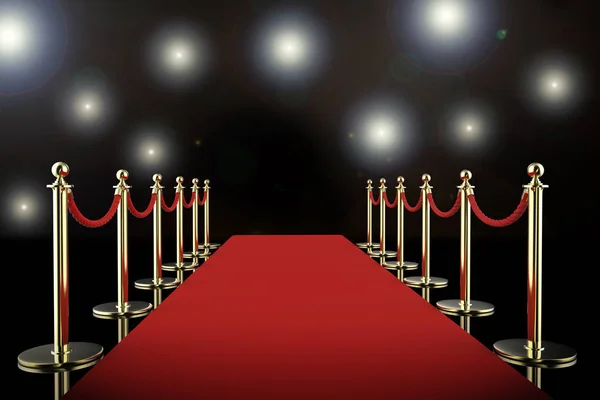 Red carpet and rope barrier with shining spotlights — Stock Photo, Image