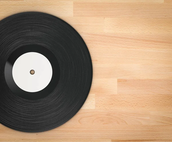 ahşap arka plan üzerinde siyah vinil kaydı