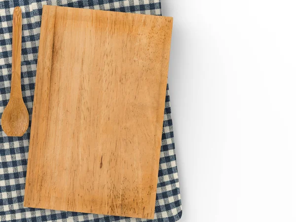 Wooden chopping board with spoon — Stock Photo, Image