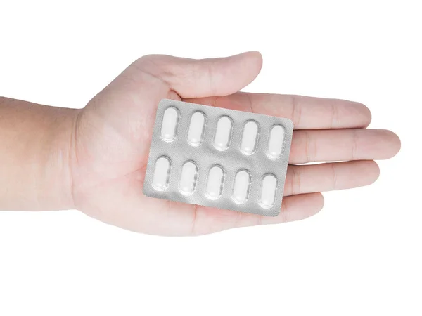 Embalagem blister de comprimidos na mão — Fotografia de Stock