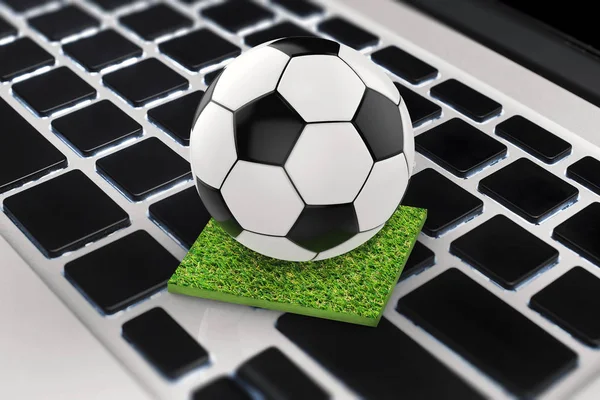 Soccer ball on computer keyboard — Stock Photo, Image