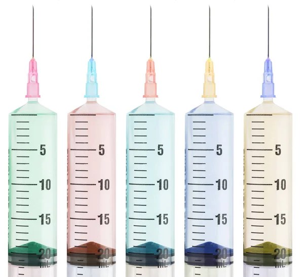 Colorful syringes on white background — Stock Photo, Image