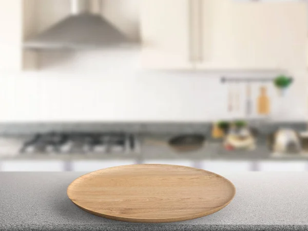 Wooden plate in kitchen — Stock Photo, Image