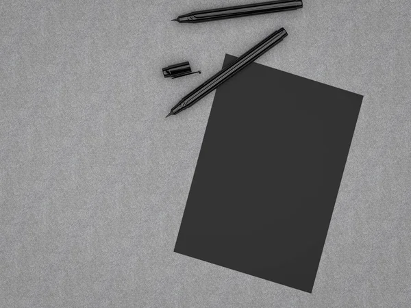 Svart blankt papper med svarta pennor — Stockfoto