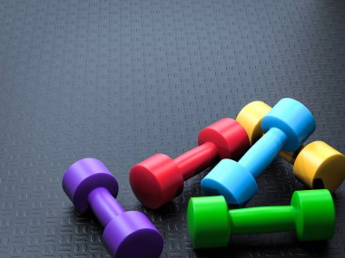 renkli dumbbells yığını
