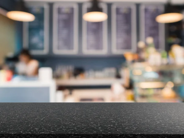 granite counter top with bakery shop background