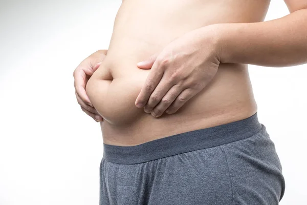 Homem com excesso de peso com mão segurando barriga gorda — Fotografia de Stock