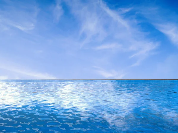 Infinity pool with blue sky — Stock Photo, Image