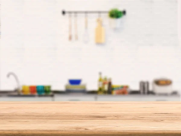 Деревянный стол с кухонным фоном — стоковое фото
