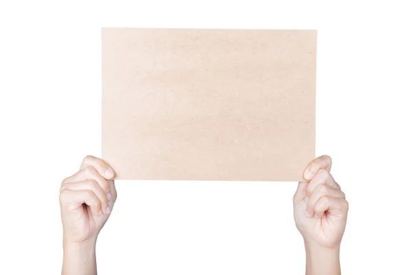 Ruka držící hnědé prázdný papír — Stock fotografie