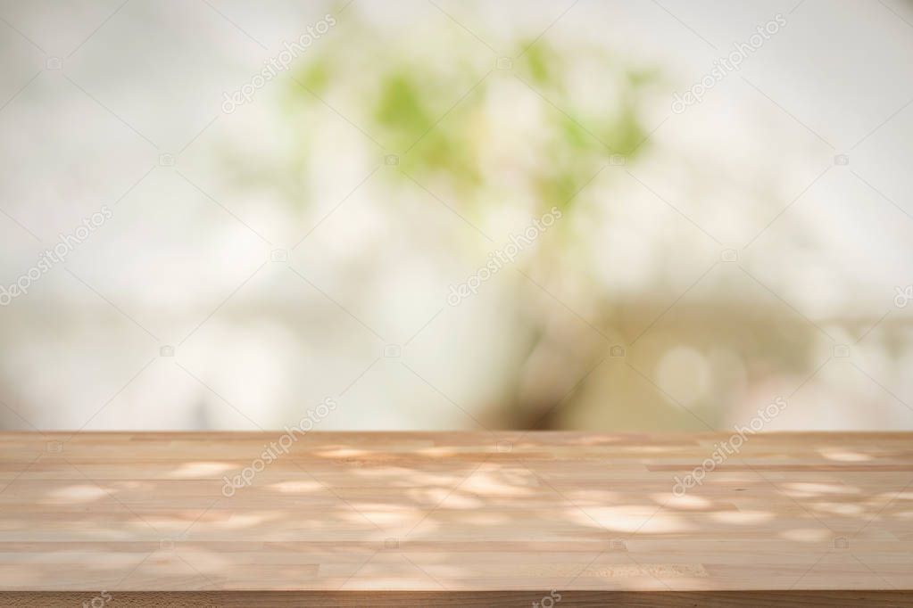 wooden table with abstract background