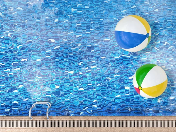 Beach balls on pool — Stock Photo, Image