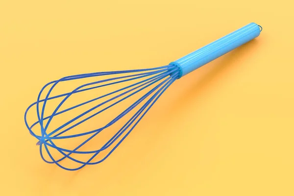 Wire whisk on yellow background — Stock Photo, Image
