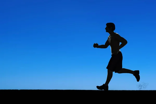 Silhouette man running — Stock Photo, Image