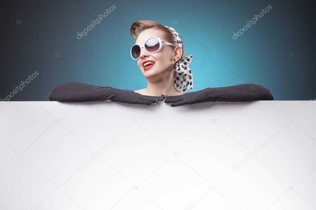 Pin Up girl holding a white board