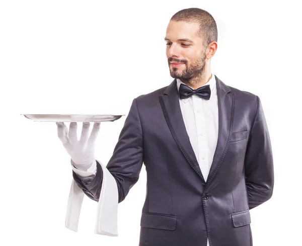 Camarero sosteniendo bandeja vacía y servilleta — Foto de Stock