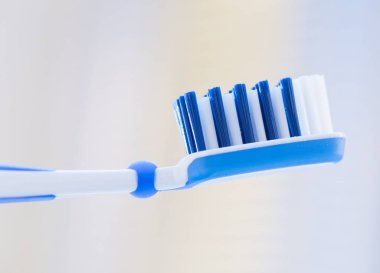 Diş fırçası arka plan bulanık üzerinde closeup