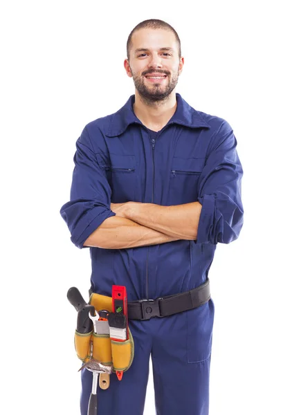 Unga arbetstagare leende med armarna korsade — Stockfoto