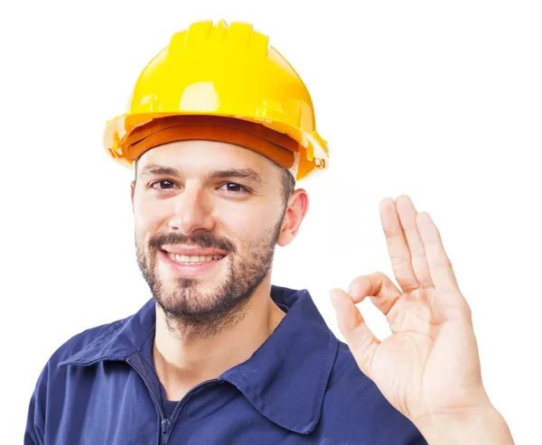 Lavoratore sorridente gesticolando segno ok — Foto Stock