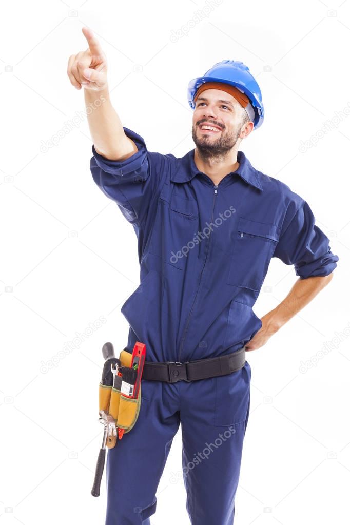 Smiling worker pointing at copy space