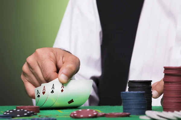 Poker player holding four aces cards — Stock Photo, Image