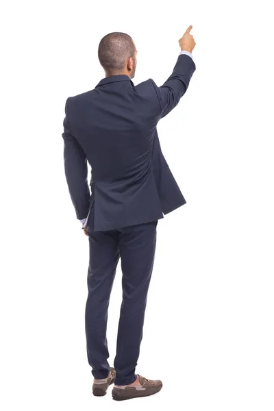 Üzletember-kék öltöny, ujjal mutatva — Stock Fotó