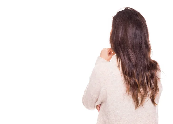 一个体贴的年轻女子的背影 孤立在一个白色的背景 — 图库照片