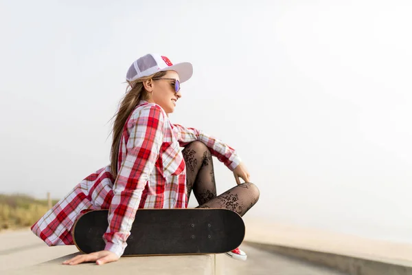 Cute Skater Girl Sitting Skateboard Beach — Stock Photo, Image
