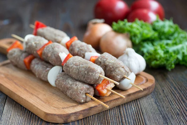 Fresh raw minced meat skewers kebabs — Stock Photo, Image