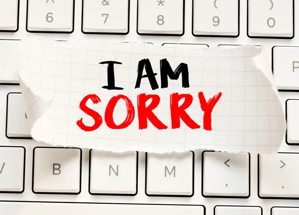 I am sorry card on the keyboard — Stock Photo, Image