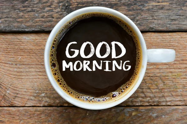 カップでコーヒーを飲みながら朝の碑文 — ストック写真