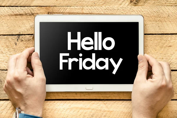 Hello Friday on tablet screen in hands