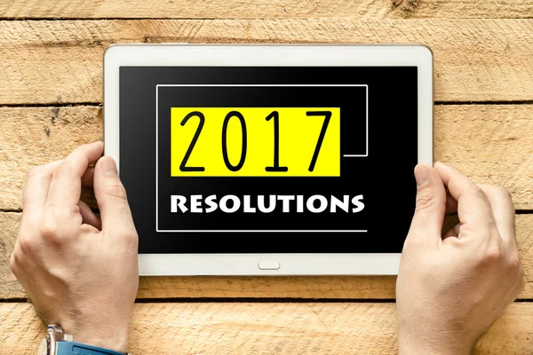 2017 resolutioner om Tablet PC-skärmen i händer — Stockfoto