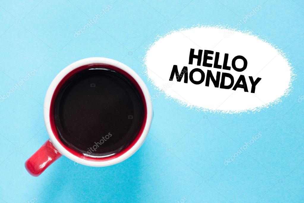 Hello Monday inscription by cup of coffee