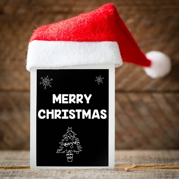 Blackboard with santa hat — Stock Photo, Image