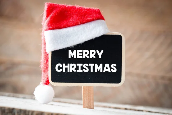 Blackboard with santa hat — Stock Photo, Image