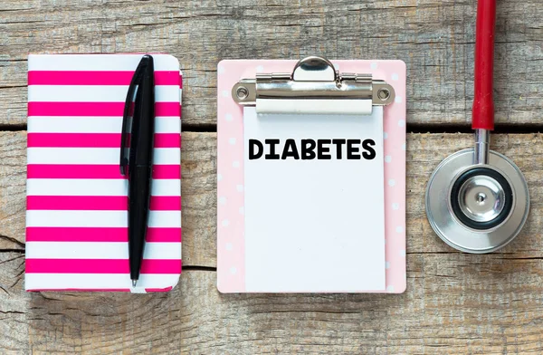 Signboard and stethoscope on table — Stock Photo, Image