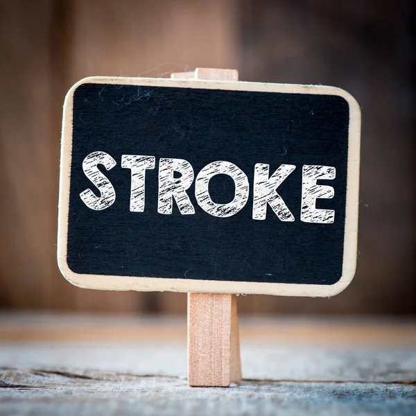 Stroke handwritten on blackboard — Stock Photo, Image