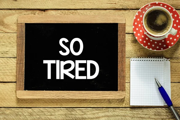 So tired handwritten on blackboard — Stock Photo, Image