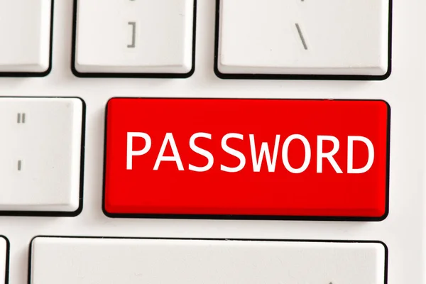 Красная кнопка с парольной надписью — стоковое фото