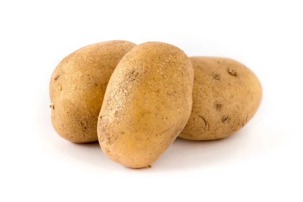 Drie aardappelen, geïsoleerd — Stockfoto